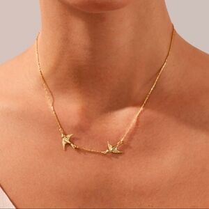 Anthropologie Gold Double Swallow Necklace